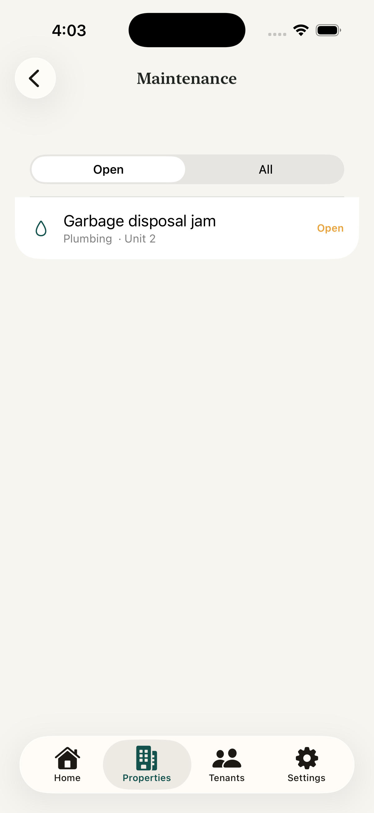 iPhone showing the Maintenance screen with an Open filter selected and one open plumbing issue, a garbage disposal jam in Unit 2.